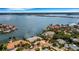 Aerial view of a waterfront home and community at 1903 Bayshore Dr, Belleair Beach, FL 33786