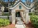 Condo entryway with covered walkway and building number at 5146 Northridge Rd # 209, Sarasota, FL 34238
