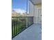 Private screened balcony overlooking green space at 5146 Northridge Rd # 209, Sarasota, FL 34238