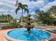 Community entrance with a beautiful tiered fountain at 5146 Northridge Rd # 209, Sarasota, FL 34238