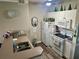Well-equipped kitchen with white cabinetry and modern appliances at 5146 Northridge Rd # 209, Sarasota, FL 34238