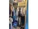 Large walk-in closet with ample hanging space and shelving at 5146 Northridge Rd # 209, Sarasota, FL 34238