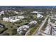 Aerial view showcasing condo's location and surrounding area at 4050 Pinebrook Cir # 14, Bradenton, FL 34209