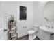 Simple bathroom with toilet and pedestal sink at 7924 Redonda Loop, Lakewood Ranch, FL 34202