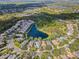 Aerial view of the home and its location within a community by the lake at 12121 Thornhill Ct, Lakewood Ranch, FL 34202