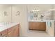 Spa-like bathroom with double vanity and a walk-in shower at 12121 Thornhill Ct, Lakewood Ranch, FL 34202