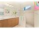Bathroom with a walk-in shower and neutral color palette at 12121 Thornhill Ct, Lakewood Ranch, FL 34202