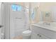 Clean bathroom with tub, shower, and white vanity at 12121 Thornhill Ct, Lakewood Ranch, FL 34202