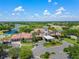 Aerial view of the community clubhouse, showcasing its architecture and landscaping at 12121 Thornhill Ct, Lakewood Ranch, FL 34202