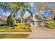 Single-Gathering home with a two-car garage and landscaped yard at 12121 Thornhill Ct, Lakewood Ranch, FL 34202