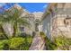 Inviting front entry with stone accents and a brick walkway at 12121 Thornhill Ct, Lakewood Ranch, FL 34202