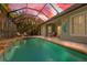 Inviting pool and patio with fountain and lanai access at 12121 Thornhill Ct, Lakewood Ranch, FL 34202