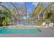 Enjoy the lake view from this screened pool and patio area at 12121 Thornhill Ct, Lakewood Ranch, FL 34202