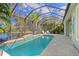 Enjoy this refreshing pool and screened patio with lake view at 12121 Thornhill Ct, Lakewood Ranch, FL 34202