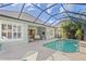 Spacious pool and patio with covered lanai and tranquil views at 12121 Thornhill Ct, Lakewood Ranch, FL 34202