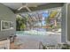Peaceful pool and patio with screened enclosure and lake view at 12121 Thornhill Ct, Lakewood Ranch, FL 34202