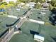 Aerial view of community tennis courts at 1648 Starling Dr # 202, Sarasota, FL 34231