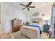 Cozy bedroom with ceiling fan, neutral tones, and coordinated decor at 317 Acerno Dr, North Venice, FL 34275