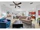 Open-concept living room flows seamlessly into the dining area and kitchen, perfect for entertaining at 317 Acerno Dr, North Venice, FL 34275
