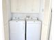 Convenient laundry closet with washer and dryer, along with ample storage space at 634 Schooner St, North Port, FL 34287