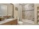 Bathroom with a shower/tub combo and built-in shelving at 8015 Bounty Ln, Lakewood Ranch, FL 34202