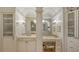 Elegant bathroom with double vanities, large mirrors, and ample storage at 8015 Bounty Ln, Lakewood Ranch, FL 34202