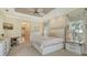 Bright main bedroom with ensuite bathroom access and sitting area at 8015 Bounty Ln, Lakewood Ranch, FL 34202