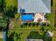 Aerial view of home with screened-in pool at 7122 Turner St, Englewood, FL 34224