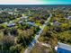 Aerial view of the house and surrounding neighborhood at 7122 Turner St, Englewood, FL 34224