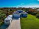 Aerial view of house, RV parking, and large yard at 7122 Turner St, Englewood, FL 34224