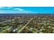 Aerial view of a neighborhood near the coast, highlighting a property at 7122 Turner St, Englewood, FL 34224