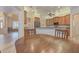 Kitchen features wood cabinets, an island, and stainless steel appliances at 6930 69Th E St, Palmetto, FL 34221
