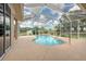 Inviting kidney-shaped pool with screened enclosure at 6930 69Th E St, Palmetto, FL 34221