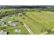 Aerial view showing a large lot with a home and outbuildings at 6930 69Th E St, Palmetto, FL 34221