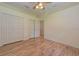 Spacious bedroom featuring wood floors and ample closet space at 6930 69Th E St, Palmetto, FL 34221