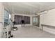 Sunroom with tiled floor, exercise equipment and window at 634 Schooner St, North Port, FL 34287