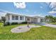 Single-story home with carport and landscaped yard at 634 Schooner St, North Port, FL 34287