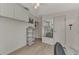 Bedroom with shelving unit and mirrored closet doors at 634 Schooner St, North Port, FL 34287