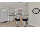 Modern kitchen with white cabinets and granite countertops at 634 Schooner St, North Port, FL 34287