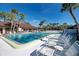 Inviting community pool with ample lounge chairs at 634 Schooner St, North Port, FL 34287