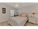 Bedroom with a double bed, nightstand, and a desk at 634 Schooner St, North Port, FL 34287