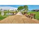 Quaint footbridge over a lake with benches nearby at 634 Schooner St, North Port, FL 34287