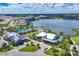 LakeHouse Cove clubhouse and resort-style pool with adjacent lake views at 7928 Mainsail Ln, Sarasota, FL 34240