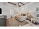 Main bedroom with wood beam ceiling and plenty of space at 7928 Mainsail Ln, Sarasota, FL 34240