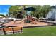 playground with modern equipment in a fenced area at 2740 Coconut Bay Ln # 329, Sarasota, FL 34237