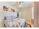 Bedroom with double doors and Parisian bedding at 2224 50Th Street E Cir, Palmetto, FL 34221