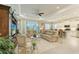Spacious living room with comfortable seating and large TV at 12715 Lake Silver Ave, Bradenton, FL 34211
