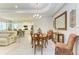 Formal dining area with chandelier and decorative mirror at 12715 Lake Silver Ave, Bradenton, FL 34211