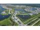 Aerial view of community amenities including pool, clubhouse and lakes at 8175 Redonda Loop, Lakewood Ranch, FL 34202