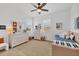 Bright bedroom featuring neutral decor, carpet, and stylish furniture at 8175 Redonda Loop, Lakewood Ranch, FL 34202